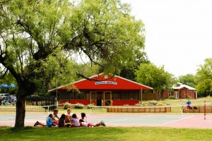 Under tree near Hondos
