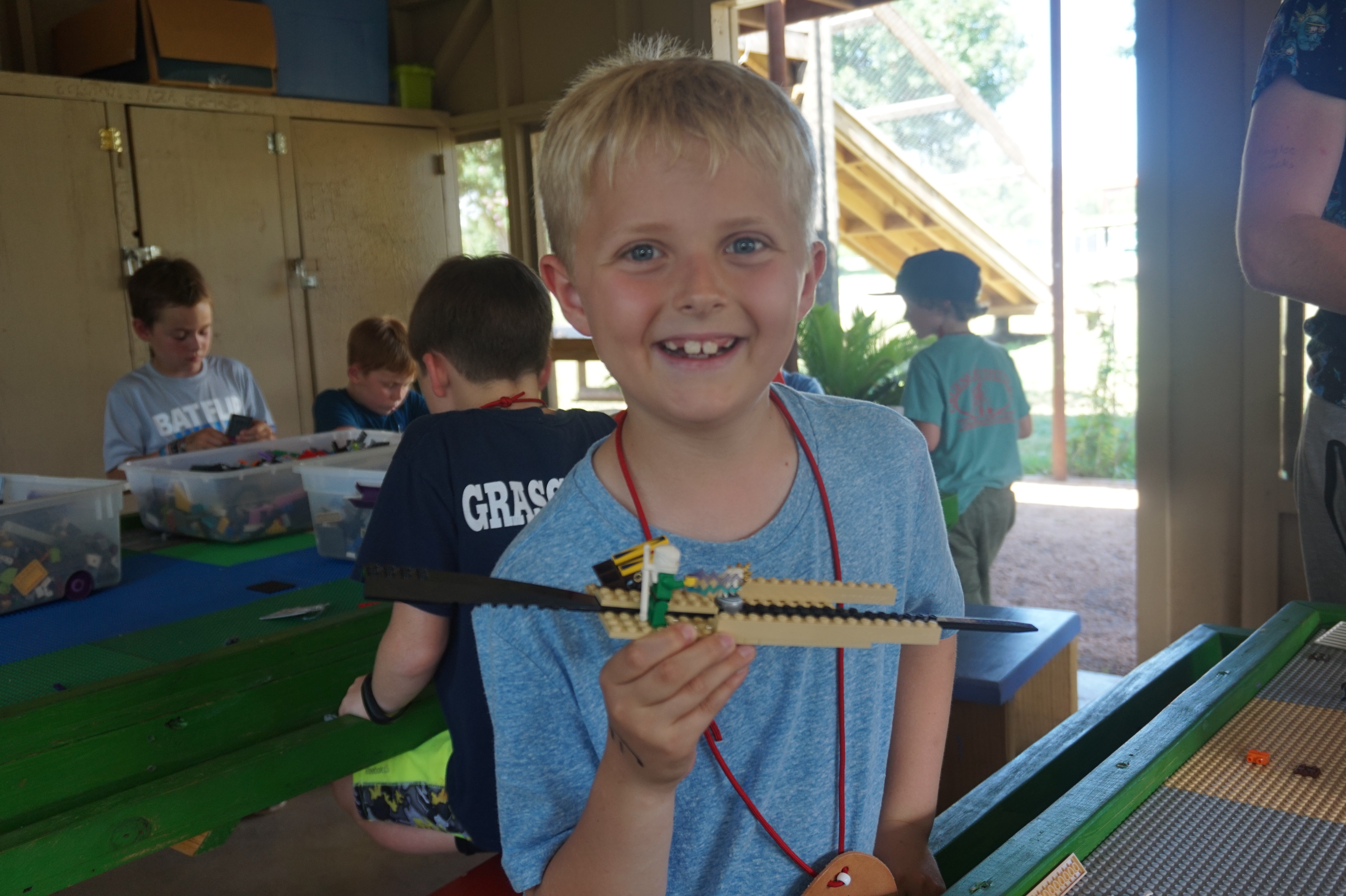 Boy with lego plane